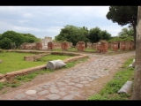 05891 ostia - regio iv - insula viii - santuario della bona dea iv,viii,3 - gesehen von der decumanus maximus - bli ri loggia di cartilio poplicola (iv,ix,1) - 2019.jpg